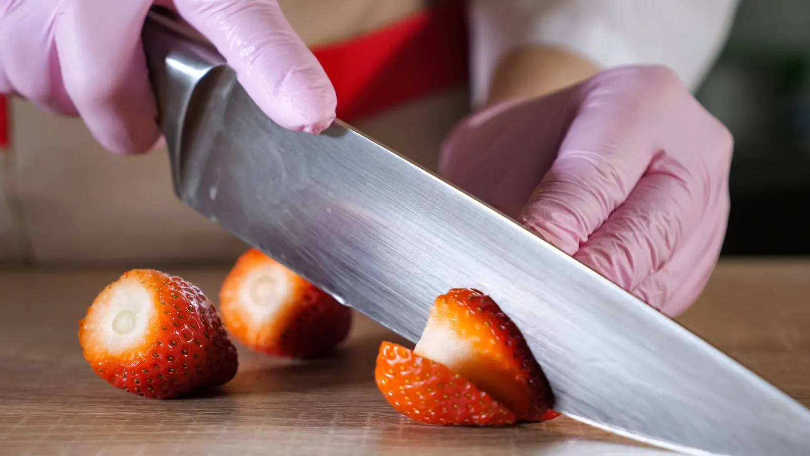 Chef cutting up strawberries