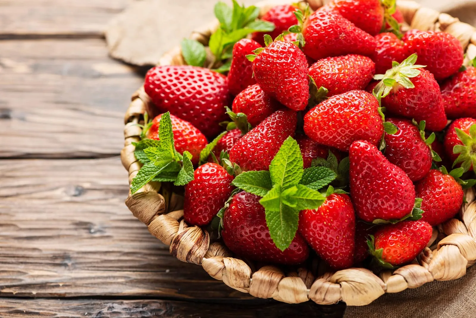 Strawberries on a bowl on a table