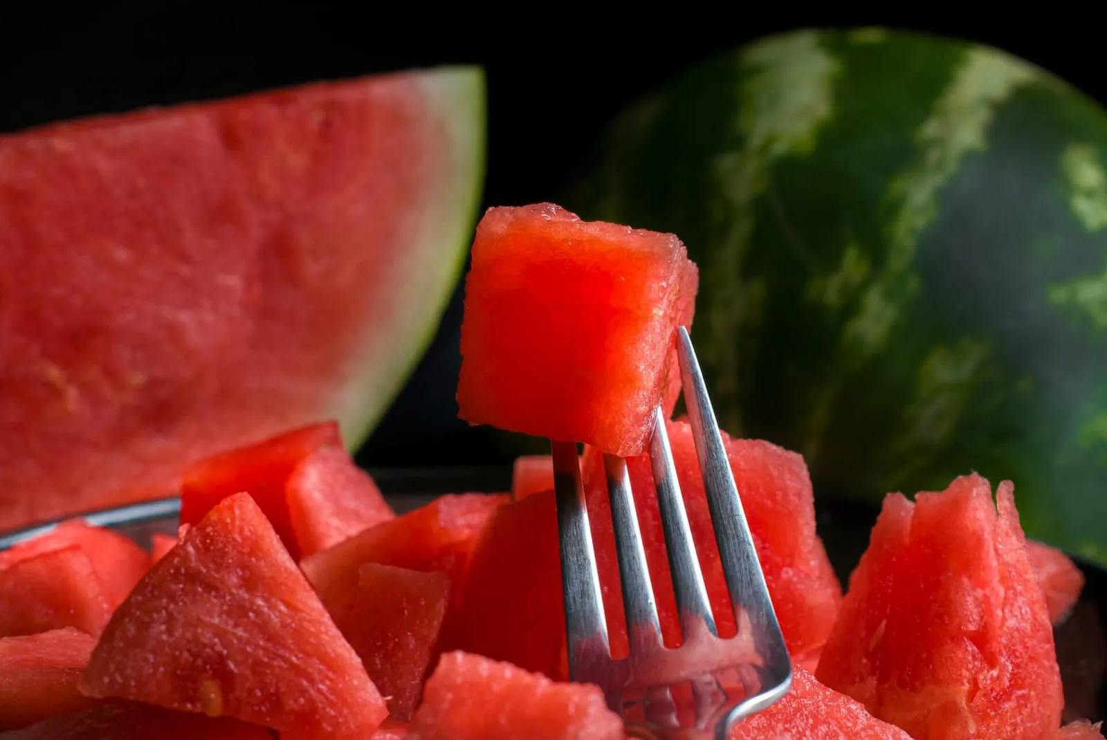Piece of watermelon on a fork