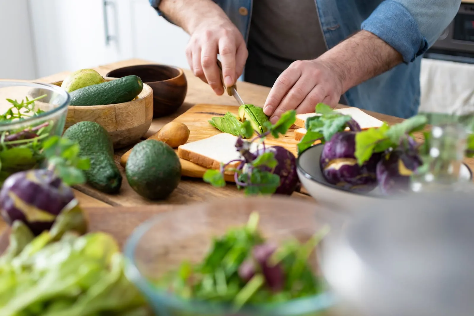 Man cutting an avocado